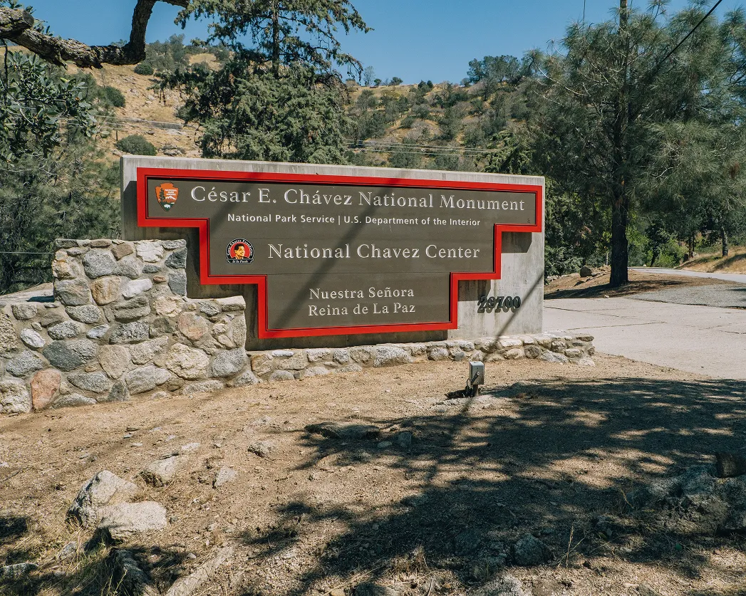 Entrance sign for the César E. Chávez National Monument and National Chavez Center in Keene, California