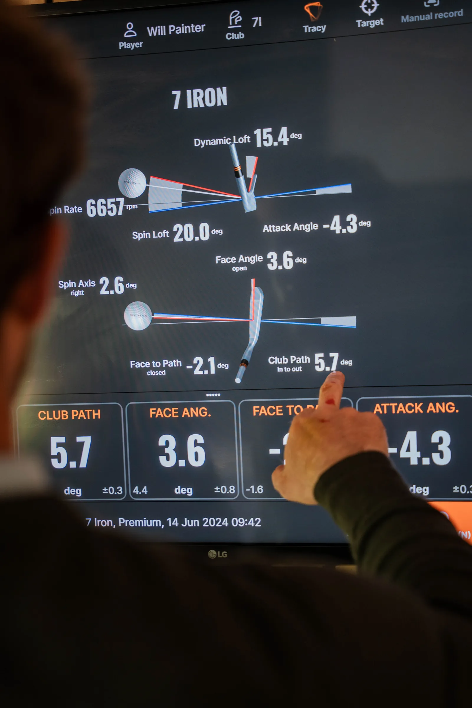 Close-up of TrackMan launch data, ball speed and spin numbers used in golf lessons.