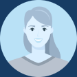 An avatar headshot on a sky blue background