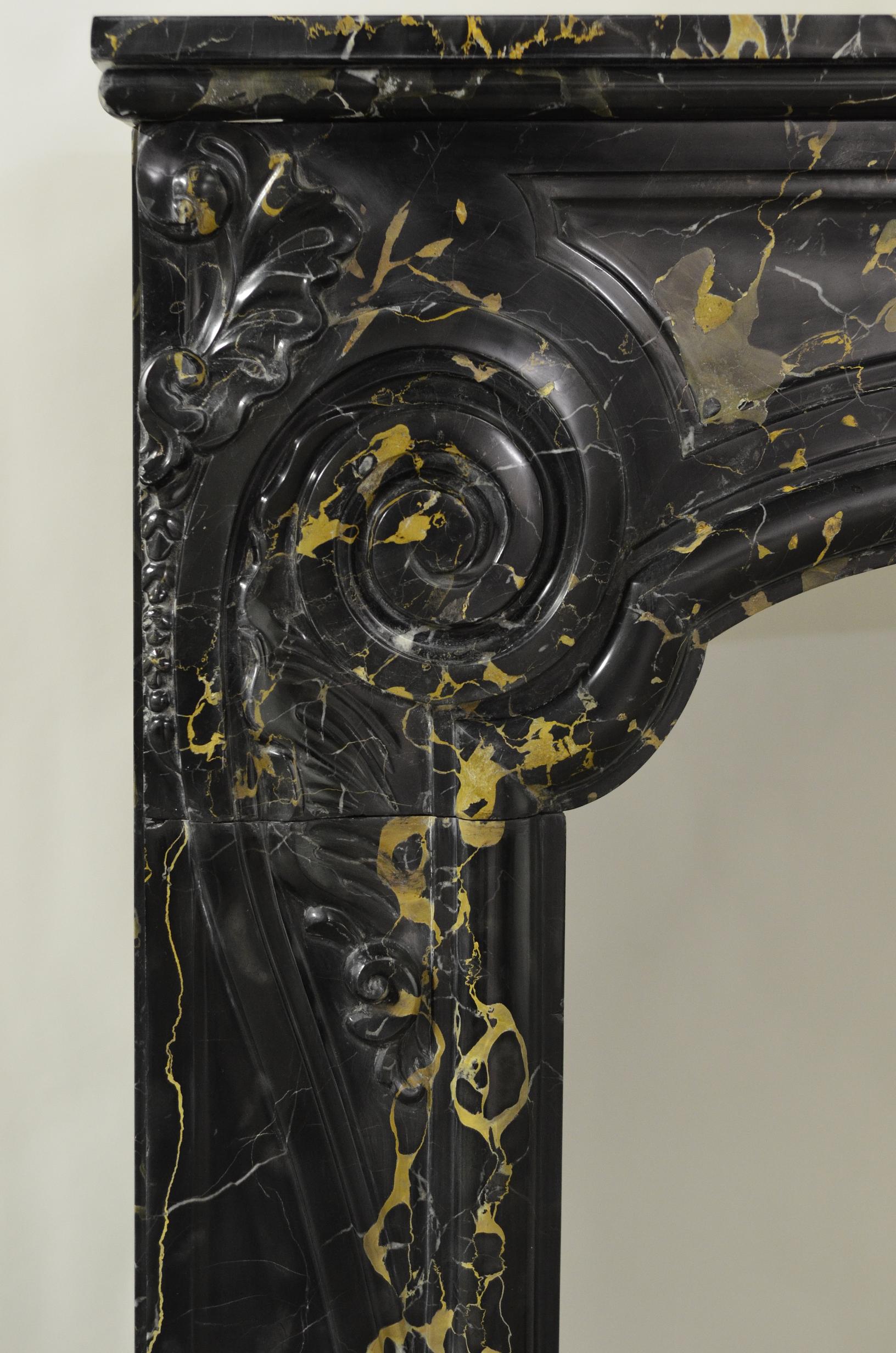 Detail of an anique Portoro Mabrle Fireplace Mantel