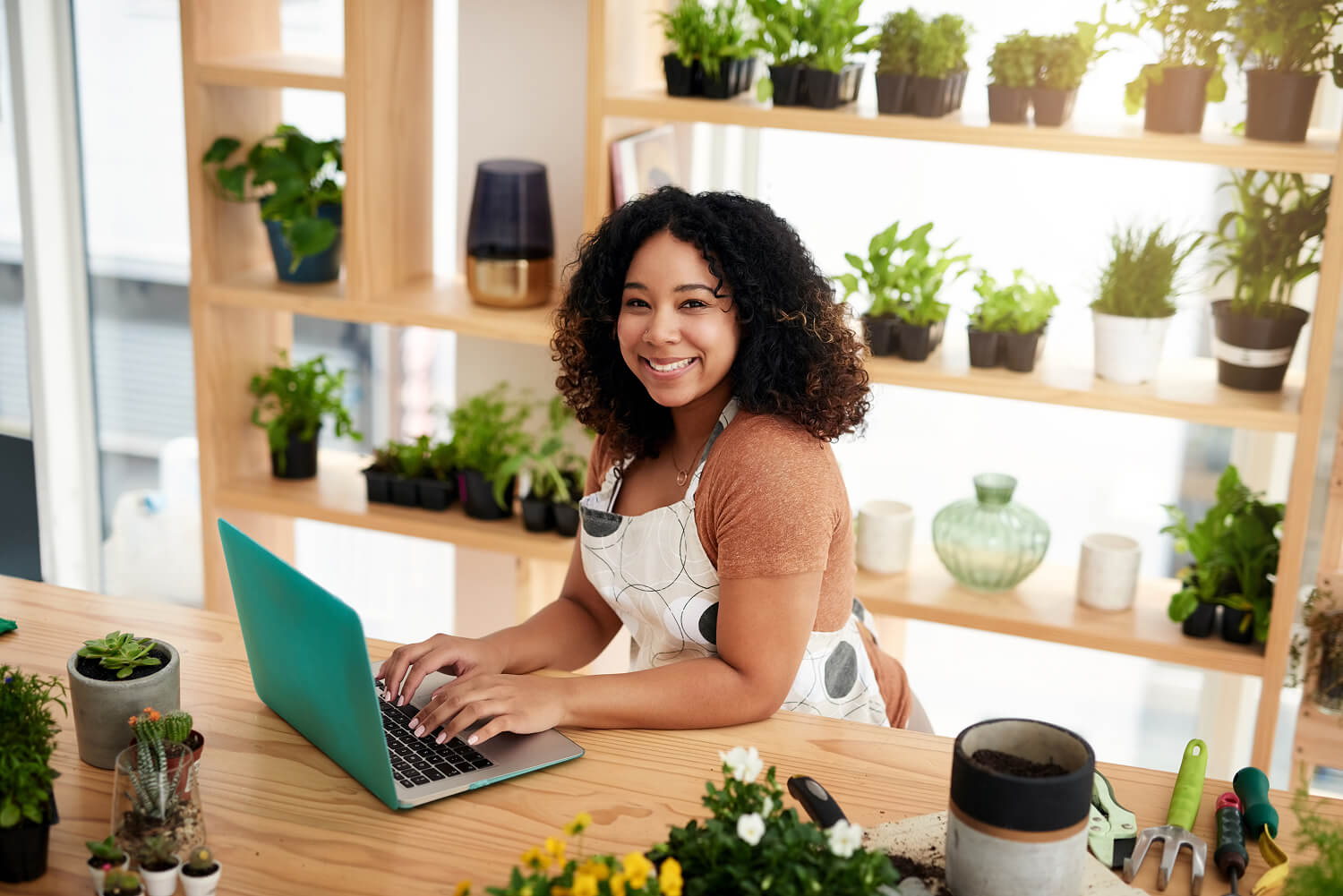 Small business owner managing an online store from home office