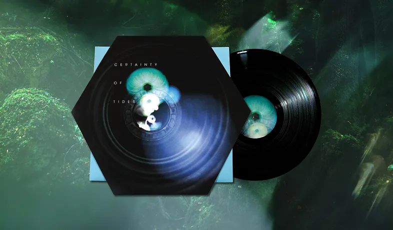 Black vinyl record and hexagonal album cover with abstract circular light patterns on blue-green background.