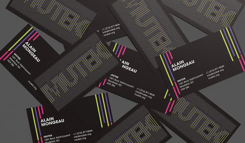 Scattered black business cards with colorful vertical lines and text reading Alain Mongeau, Mutek, and contact info.