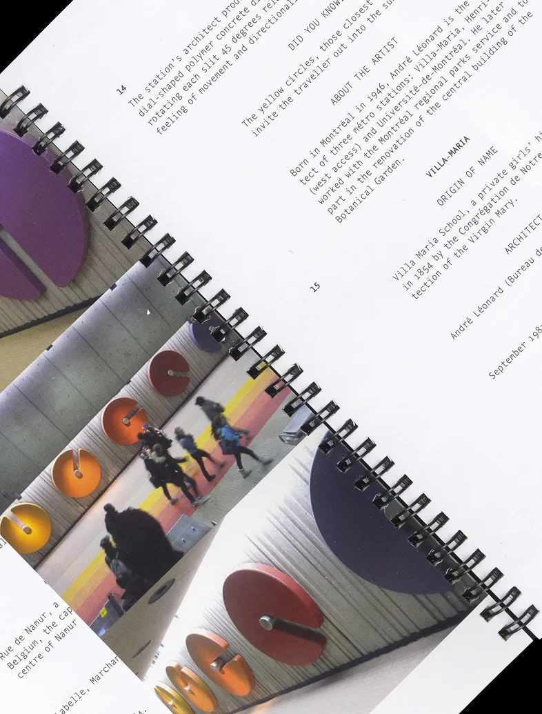 Open spiral-bound book showing text and images of a colorful station with large circular wall decorations.