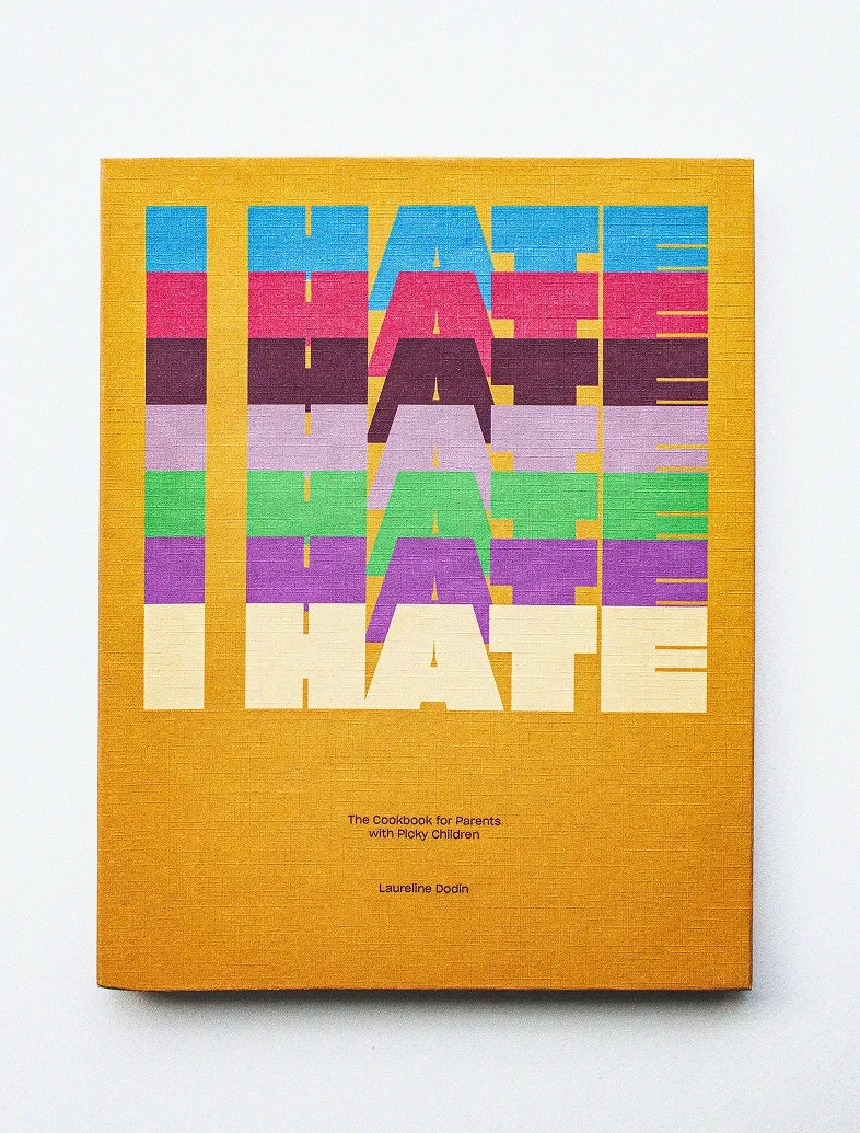 Yellow cover of book titled The Cookbook for Parents with Picky Children by Laureline Dodin with colorful text design.