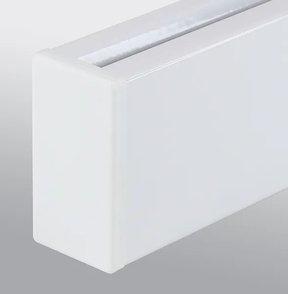 Close-up of a white rectangular LED wall light fixture with a frosted diffuser.