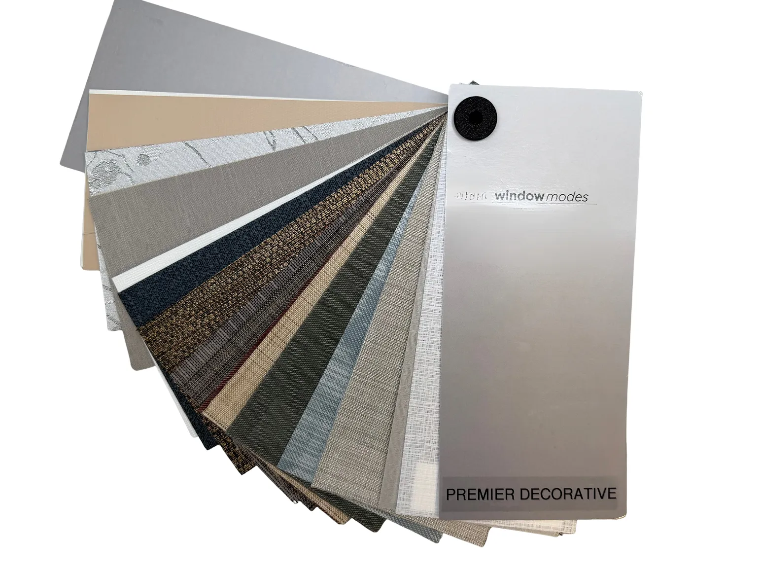 Fan of fabric swatches in neutral tones for window decor labeled Premier Decorative.