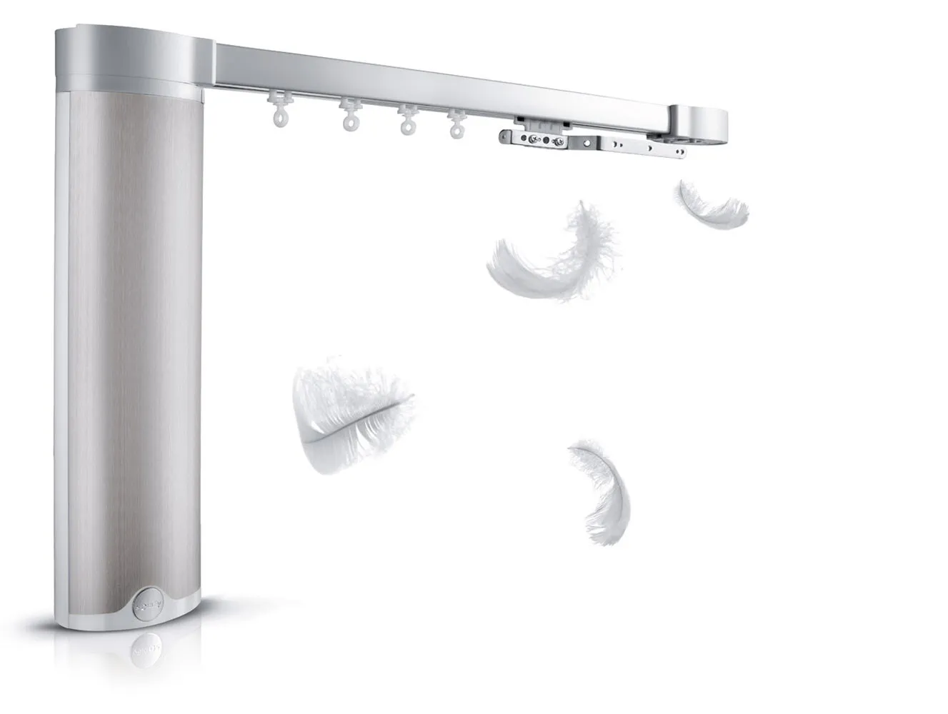 Modern silver curtain track system with white feathers floating nearby on white background.