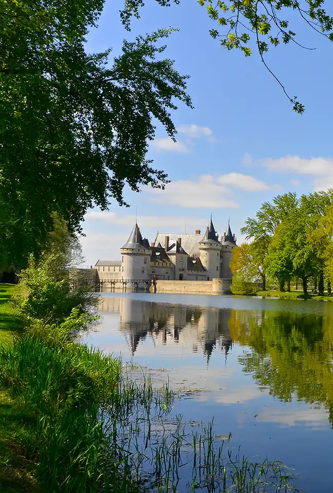 Château des Hauts de Loire—a 5-star hotel, restaurant, and spa—and its peaceful reflection in the water.