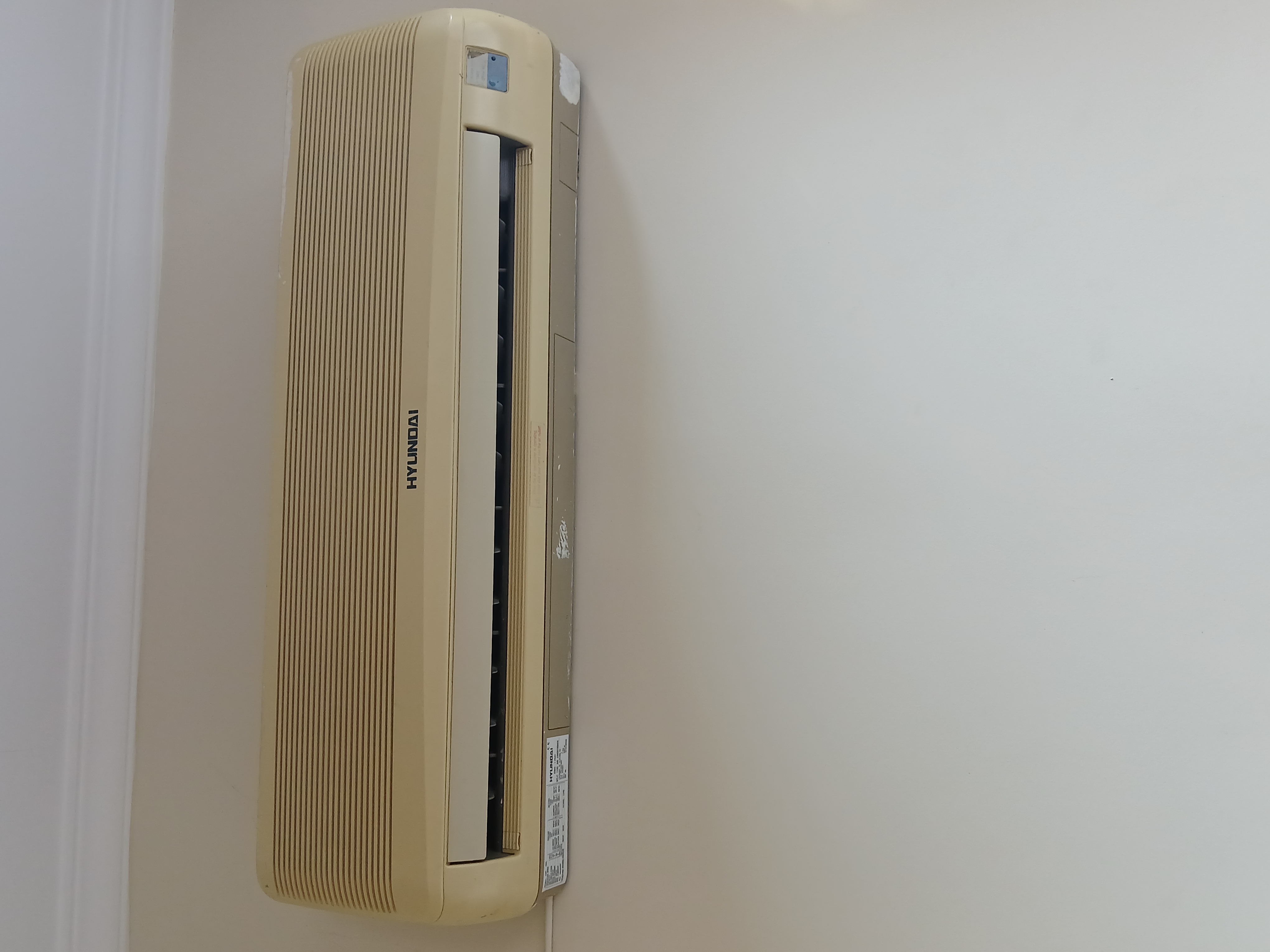 Wall-mounted ductless mini-split head cooling a bonus room in Clarksville, VA