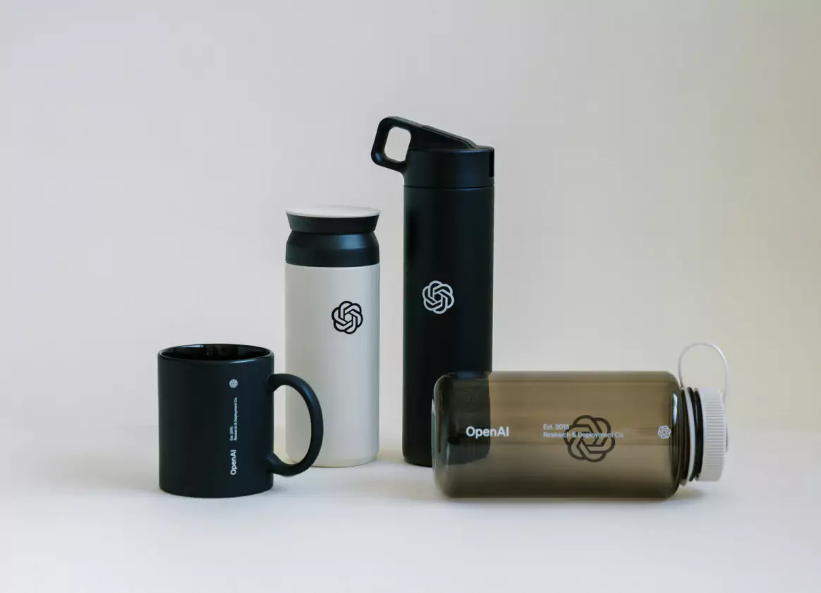 Custom branded OpenAI drinkware including water bottle, mug, and tumblers