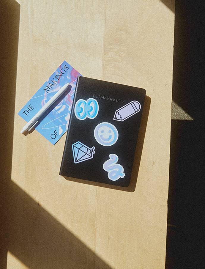 Google custom black notebook with illustrated stickers