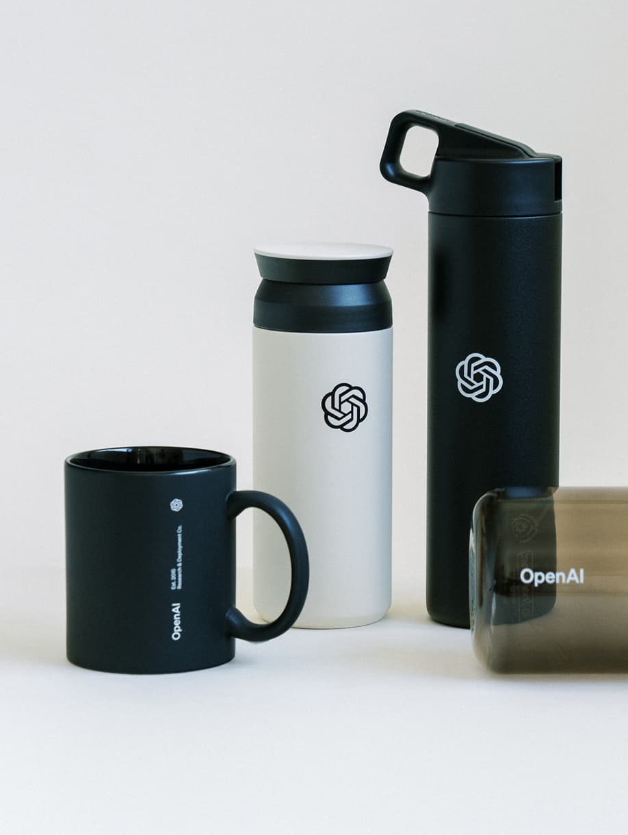 OpenAI custom branded drinkware with mugs and water bottles