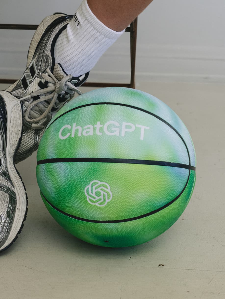 ChatGPT custom green basketball with OpenAI logo