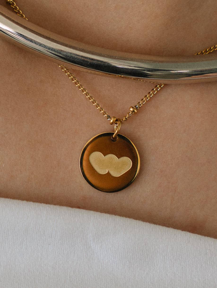 Whatnot custom pendant necklace with yellow logo