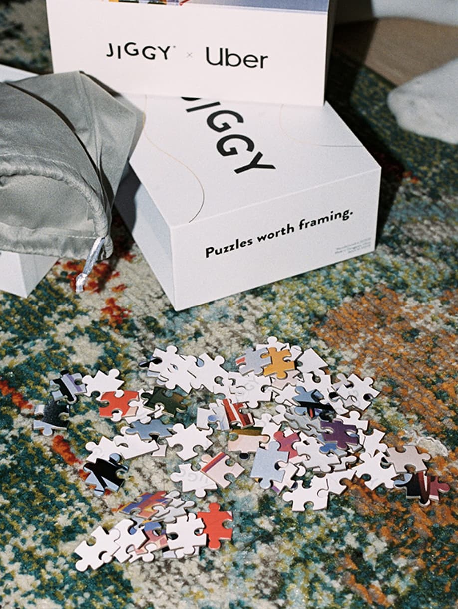 JIGGY x Uber custom puzzle boxes with colorful puzzle pieces