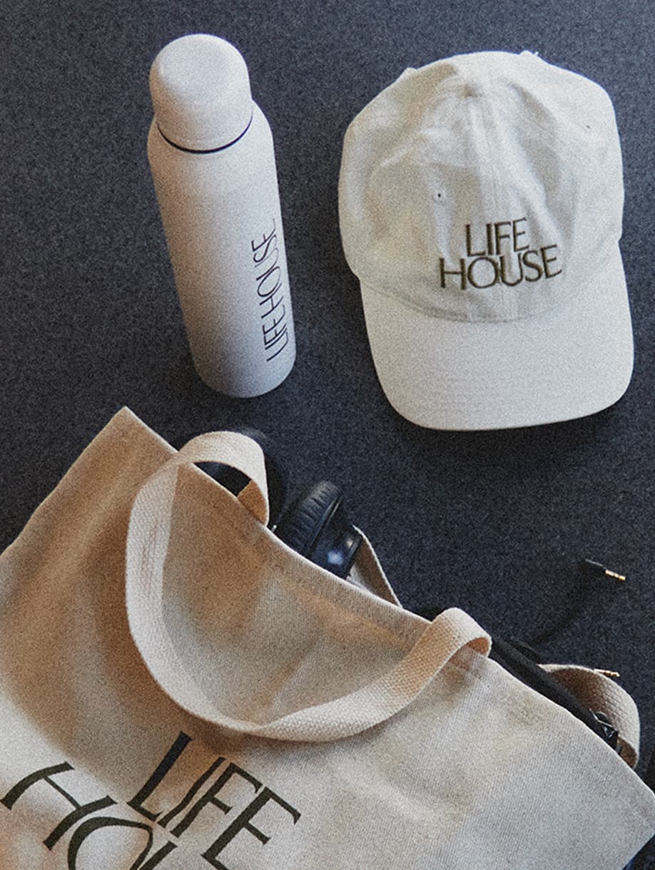 Life House custom tote bag, white cap, and water bottle