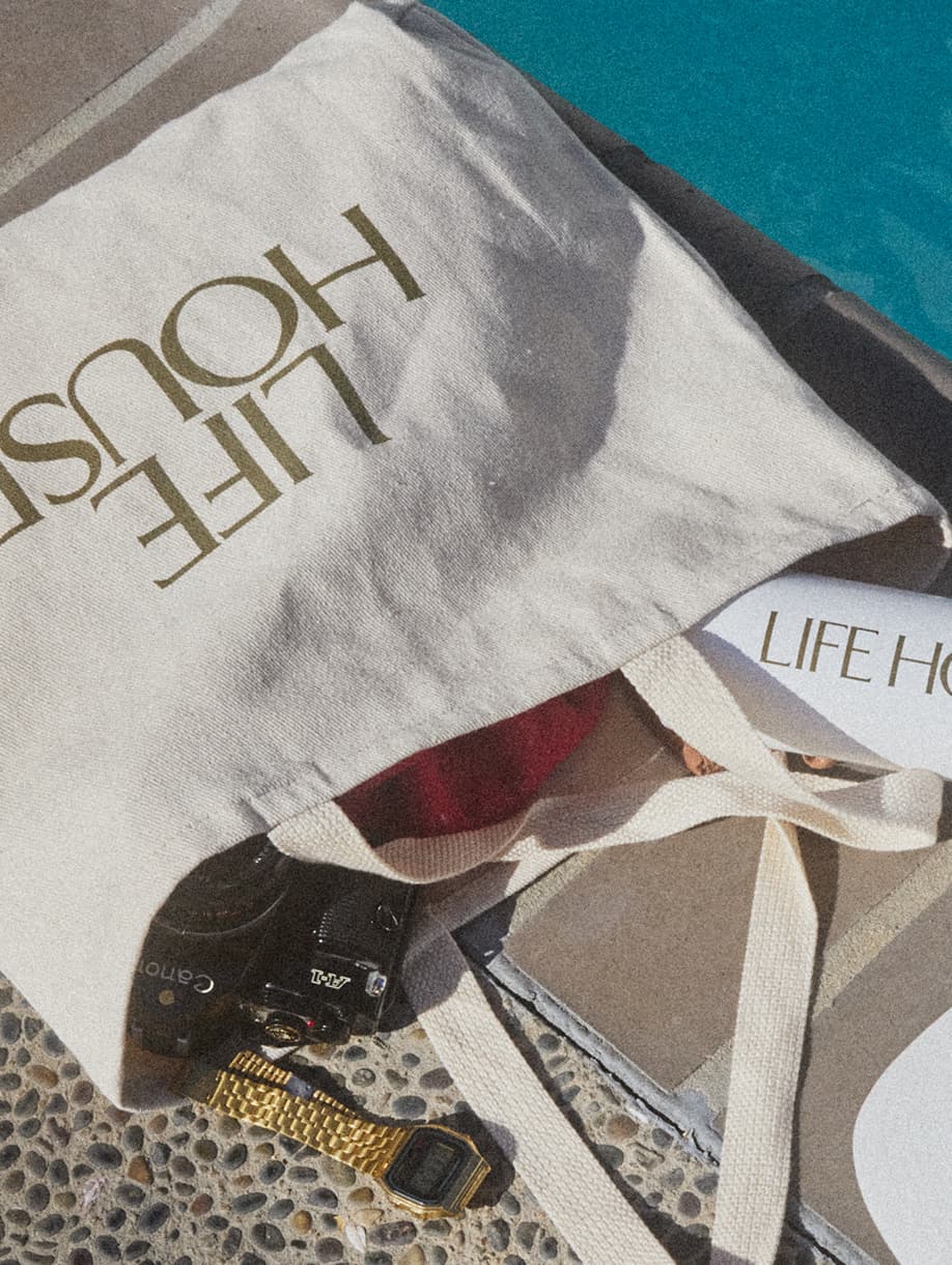Life House custom poolside tote bag, white cap, and water bottle