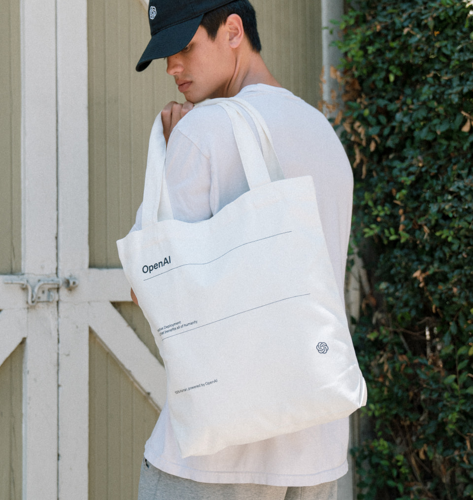 OpenAI branded tote bag and cap