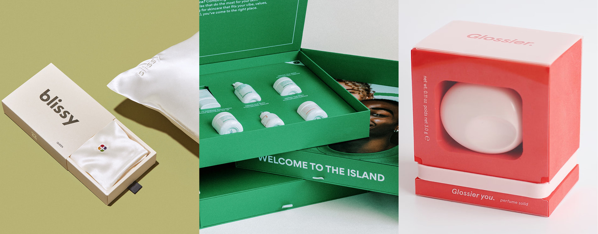 Cream Blissy box sleeve with product, green InnisFree product box stack of three, Glossier pink product product box