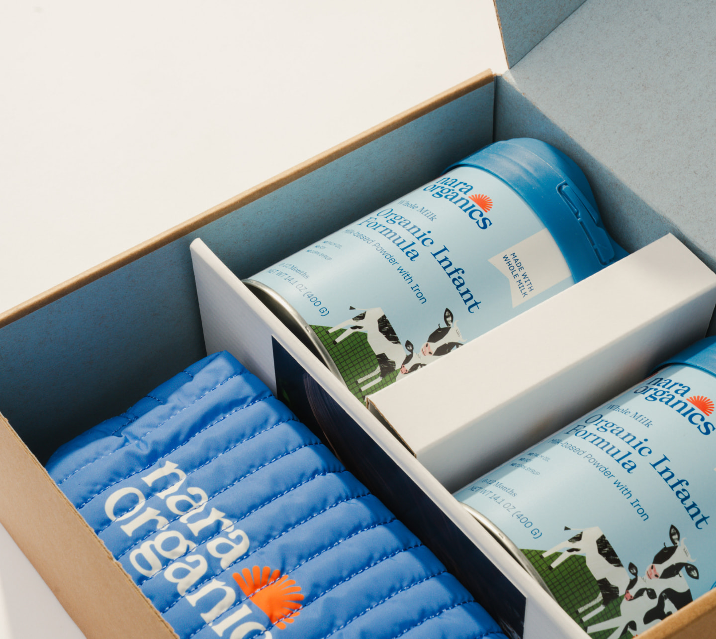 Nara Organics custom branded gift box with organic infant formula and quilted pouch