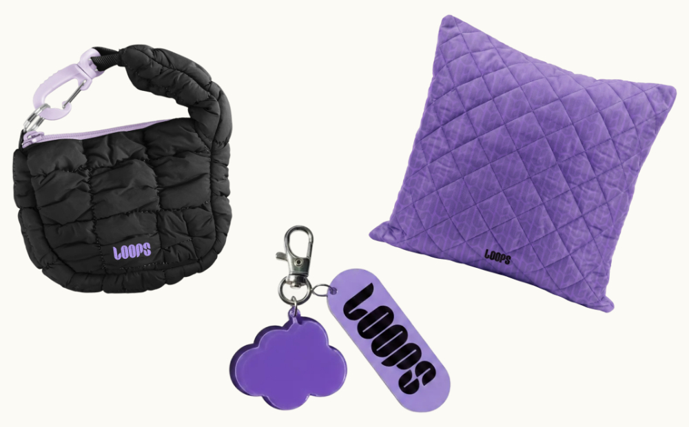 Custom Loops branded black accessory bag, purple keychain and purple pillow