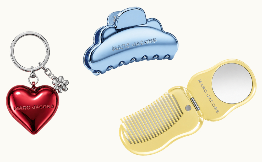 Marc Jacobs branded gift set featuring a red keychain, blue hair clip and yellow compact comb