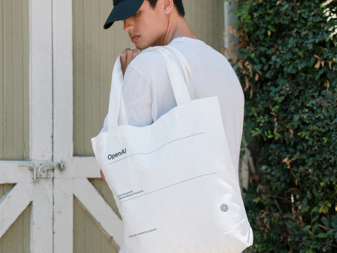 Model holding Open AI custom bag 