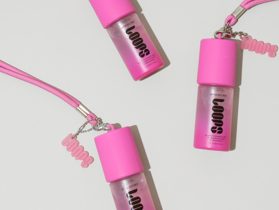 Loops branded product bottle with keychain
