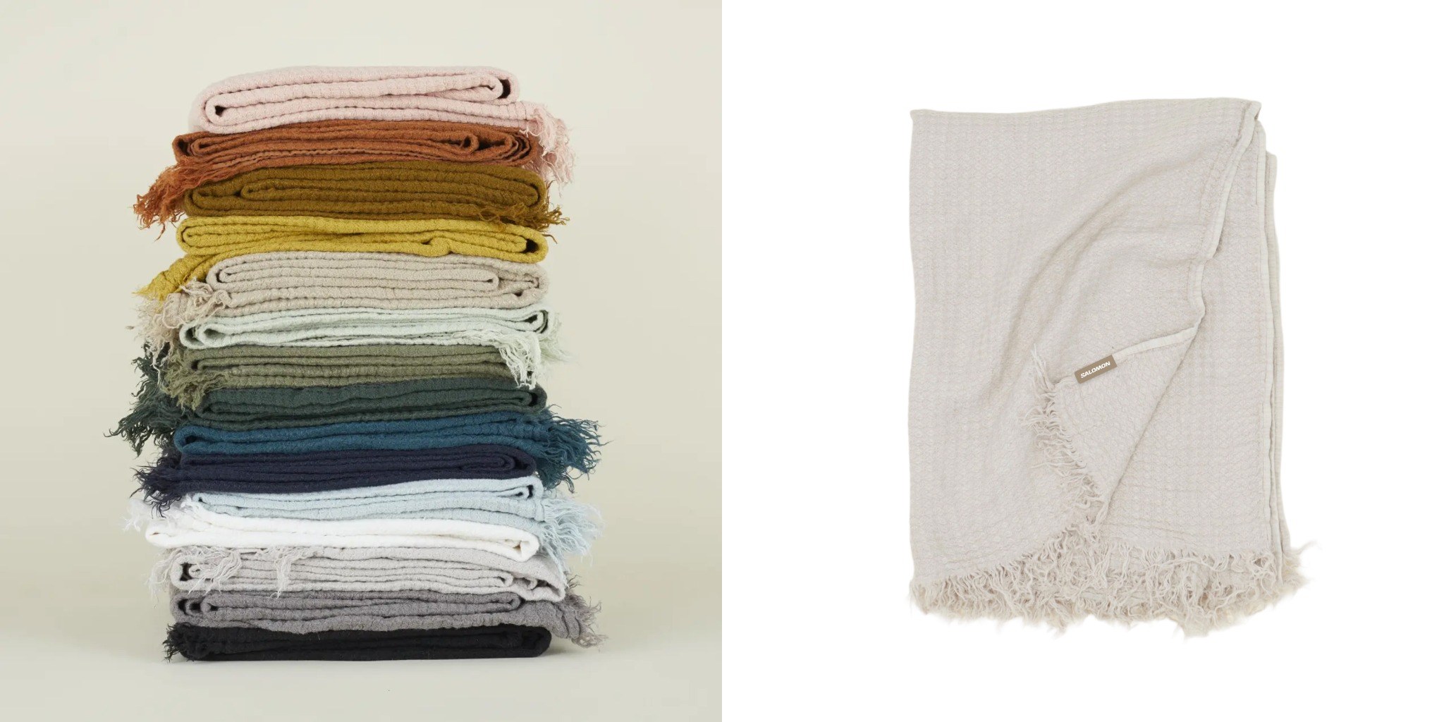 Stack of Hawkins New York linen throws in assorted colors beside a cream throw product image.