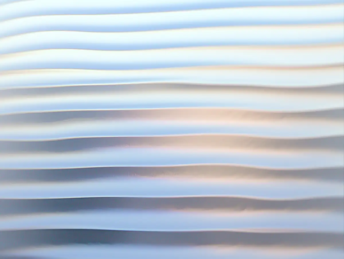 Soft wavy horizontal lines in shades of white, blue, and gray creating an abstract pattern.