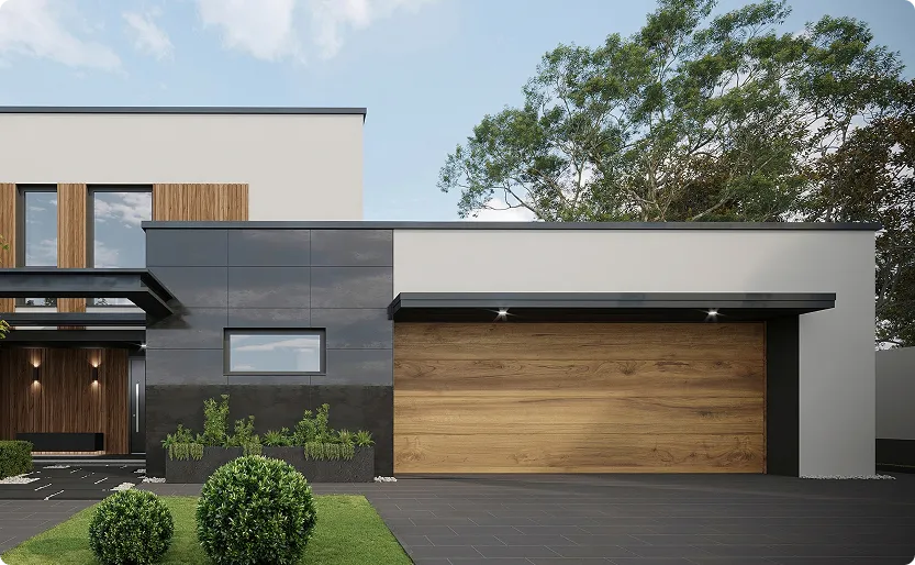 Façade moderne d'une maison avec garage en bois, murs gris et panneau noir brillant.