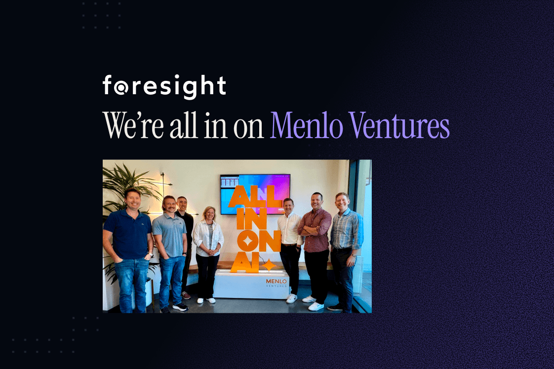 Foresight "We're all in on Menlo Ventures" cover: a team of seven standing in front of a screen displaying "ALL IN ON AI" at a Menlo Ventures event.