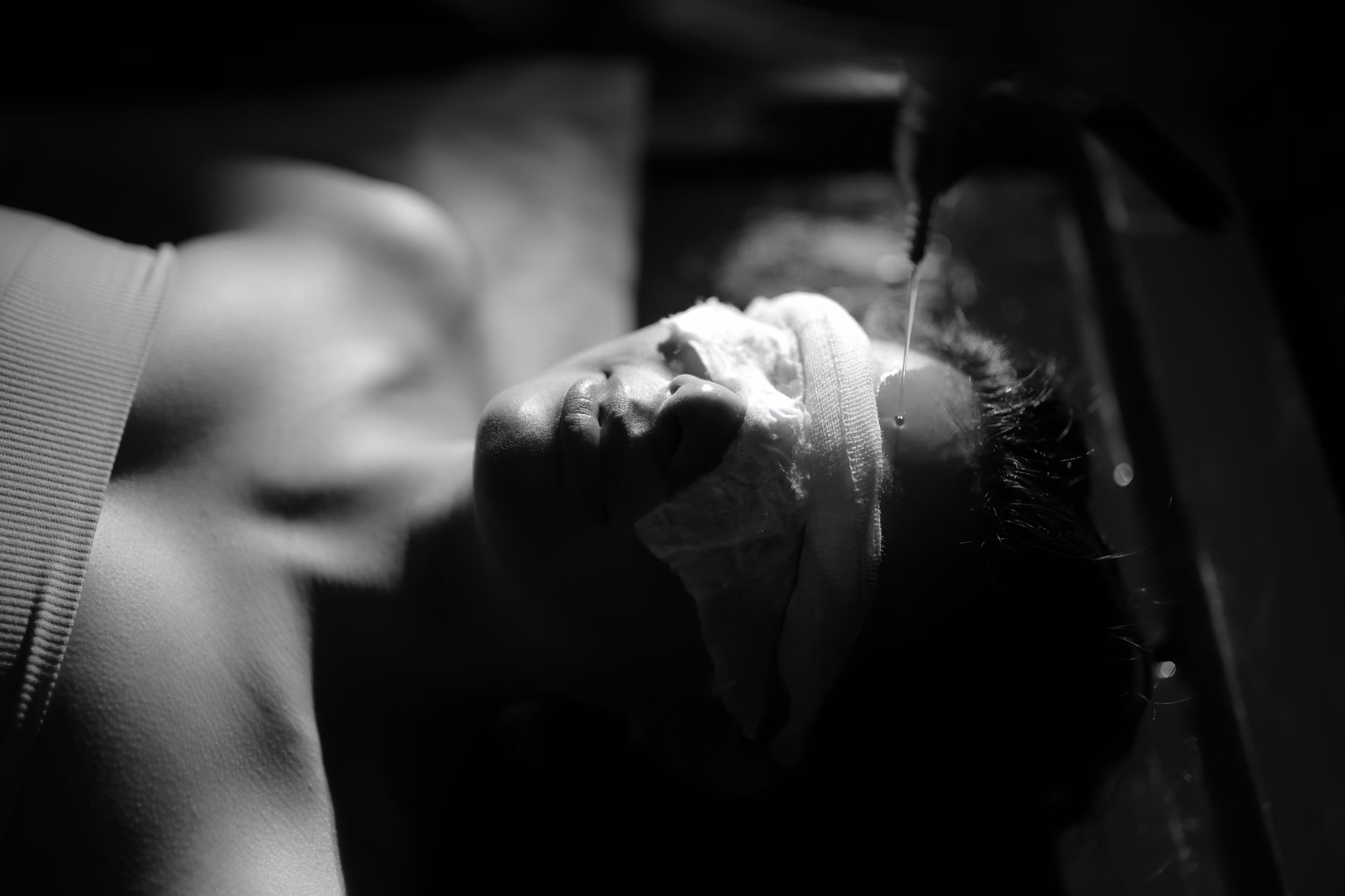 A guest receiving a facial treatment at VELA Spa in Windsor NSW