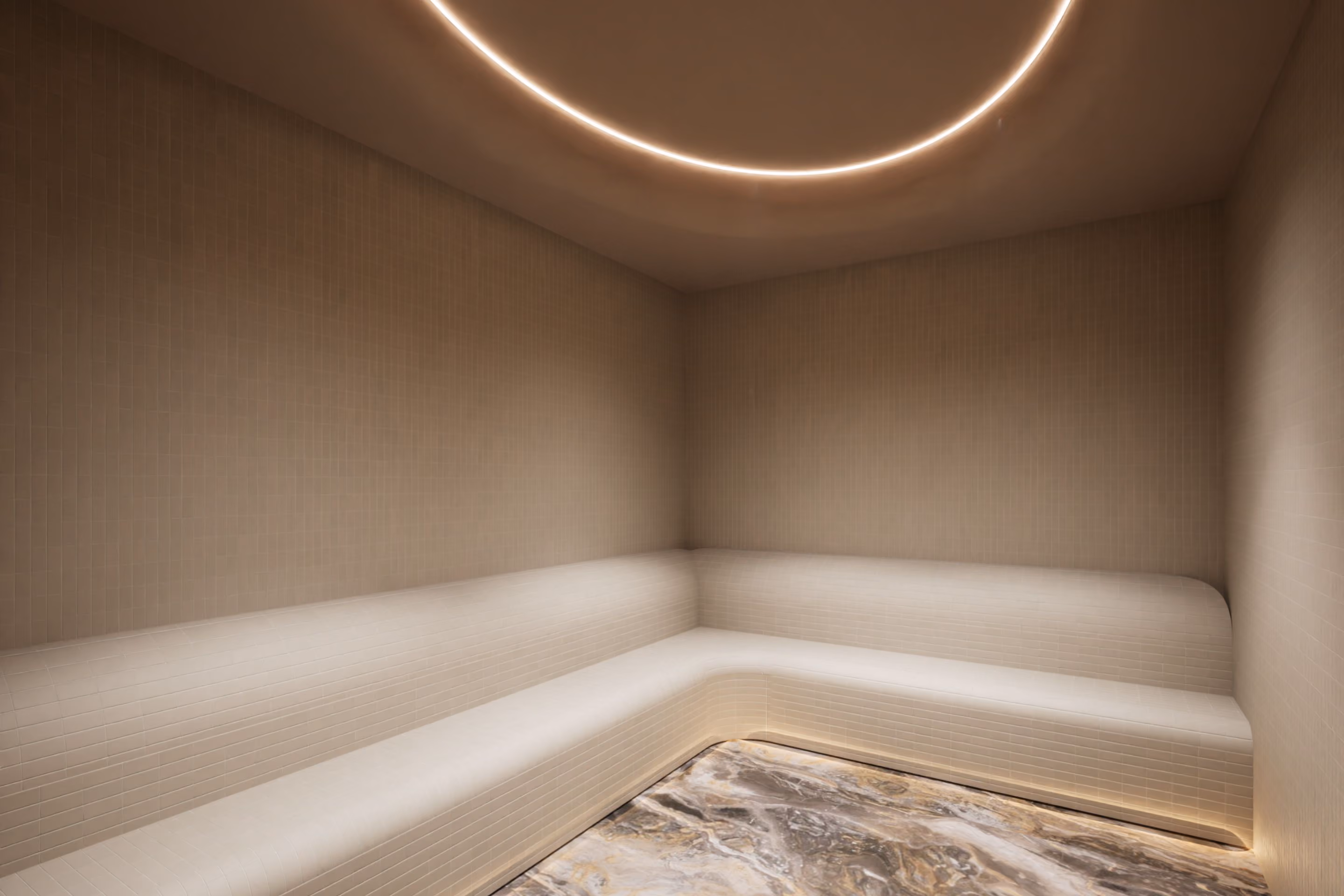A quiet bathhouse room at VELA lit by a single circular ceiling light
