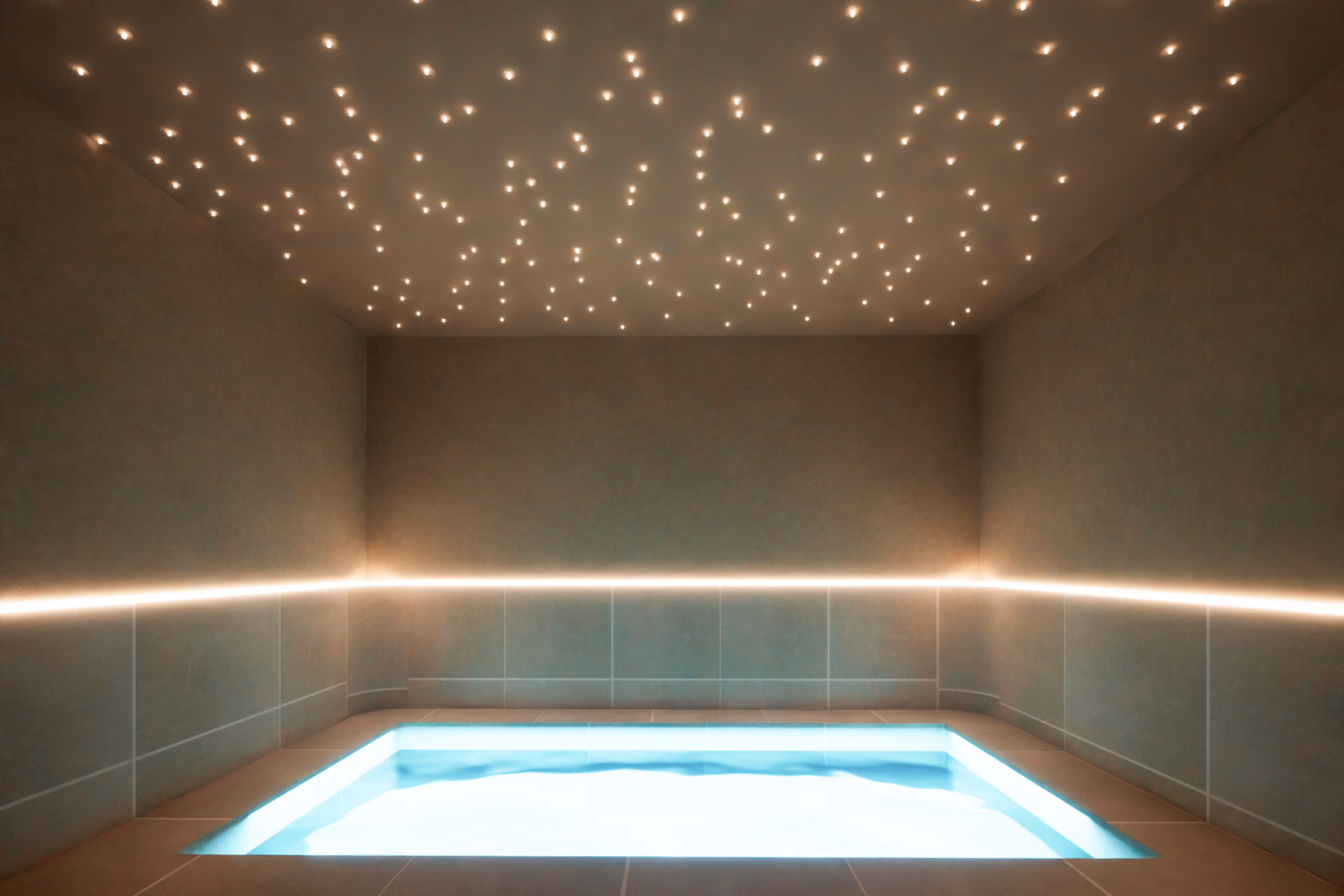 A float pool beneath a starlit ceiling in a private float suite at VELA