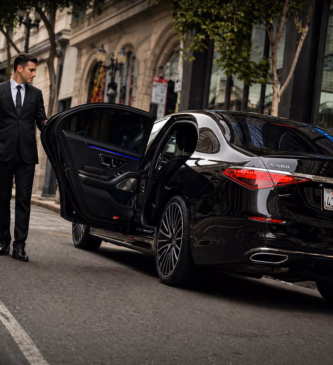 Black Mercedes-Benz S-Class sedan shown from a side profile view