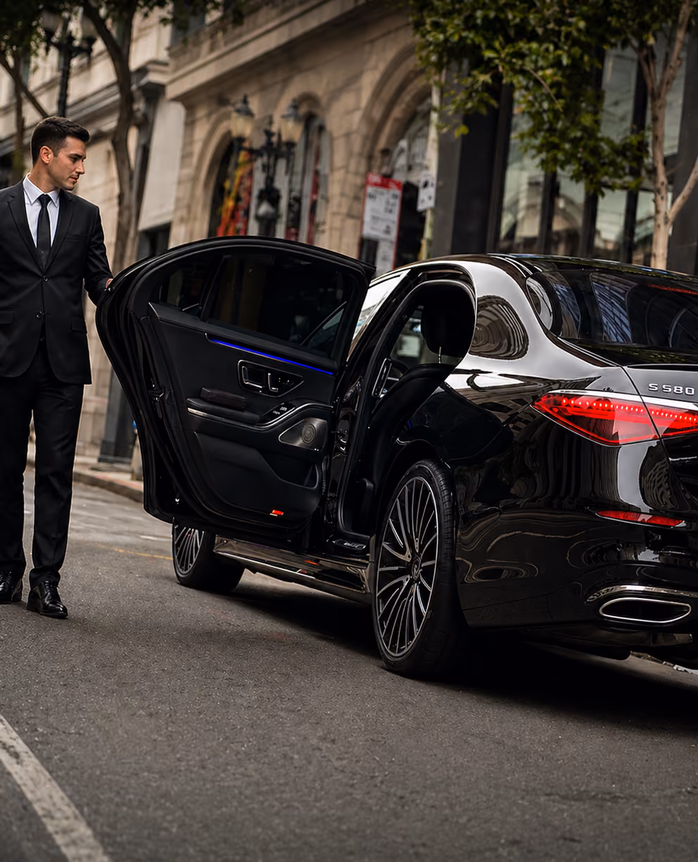 Black Mercedes-Benz S-Class sedan photographed from the front three-quarter angle