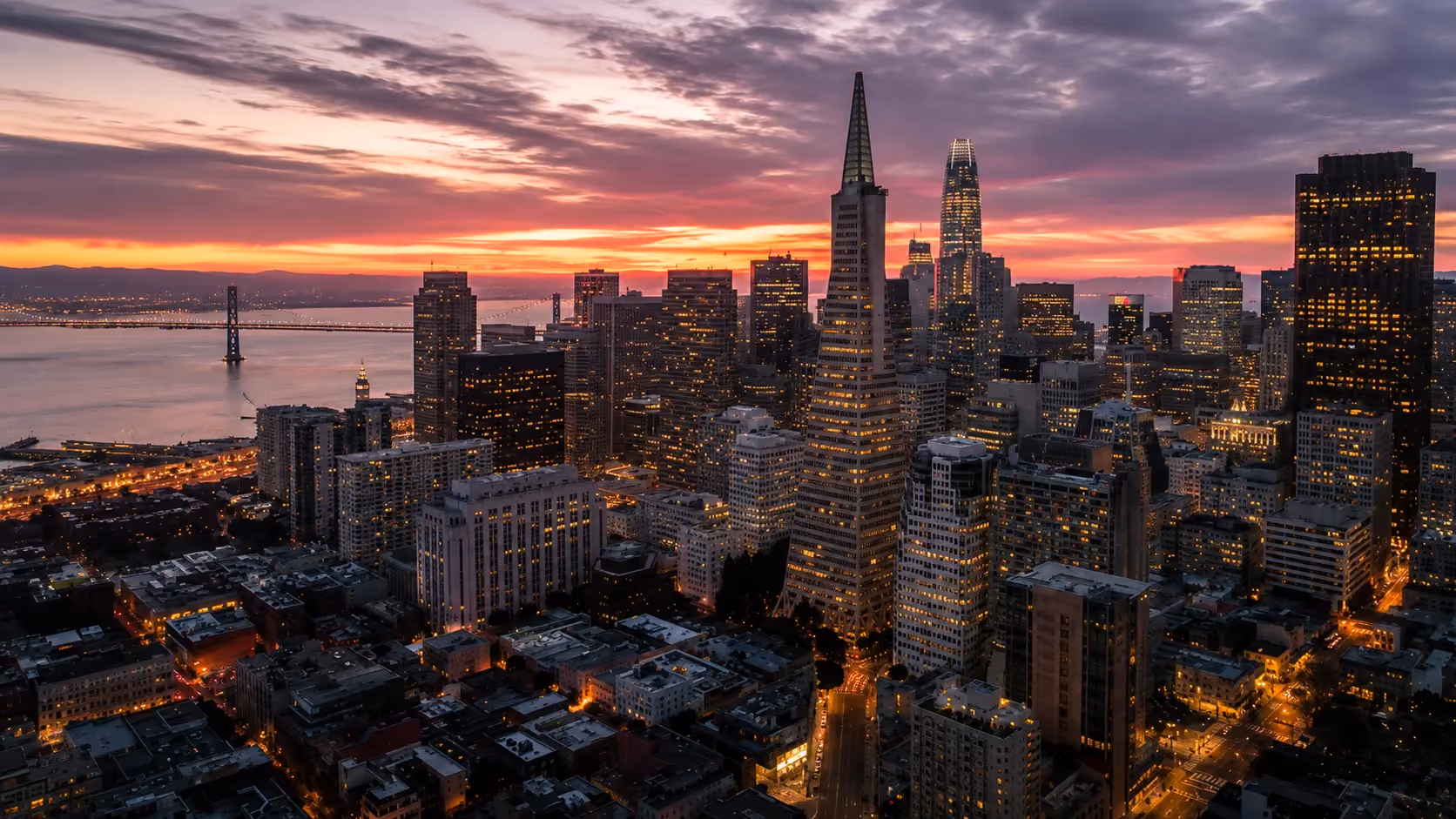 San Francisco skyline with the Golden Gate Bridge at dusk