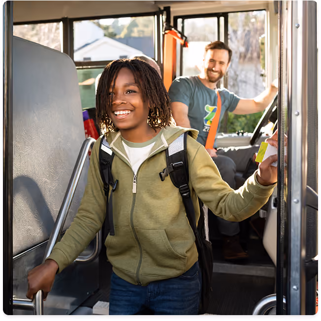Student disembarking bus