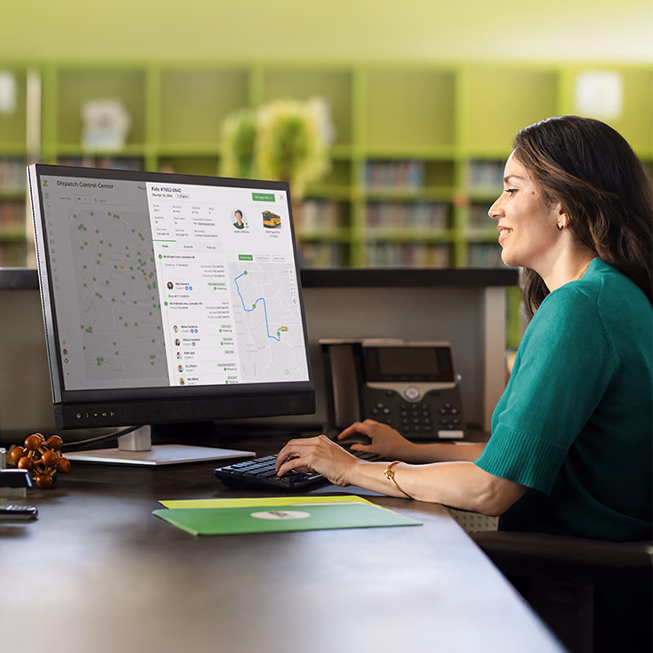 A school administrator using Zum's Dispatch Control Center to track a bus ride, viewing the route map and student pickup list.