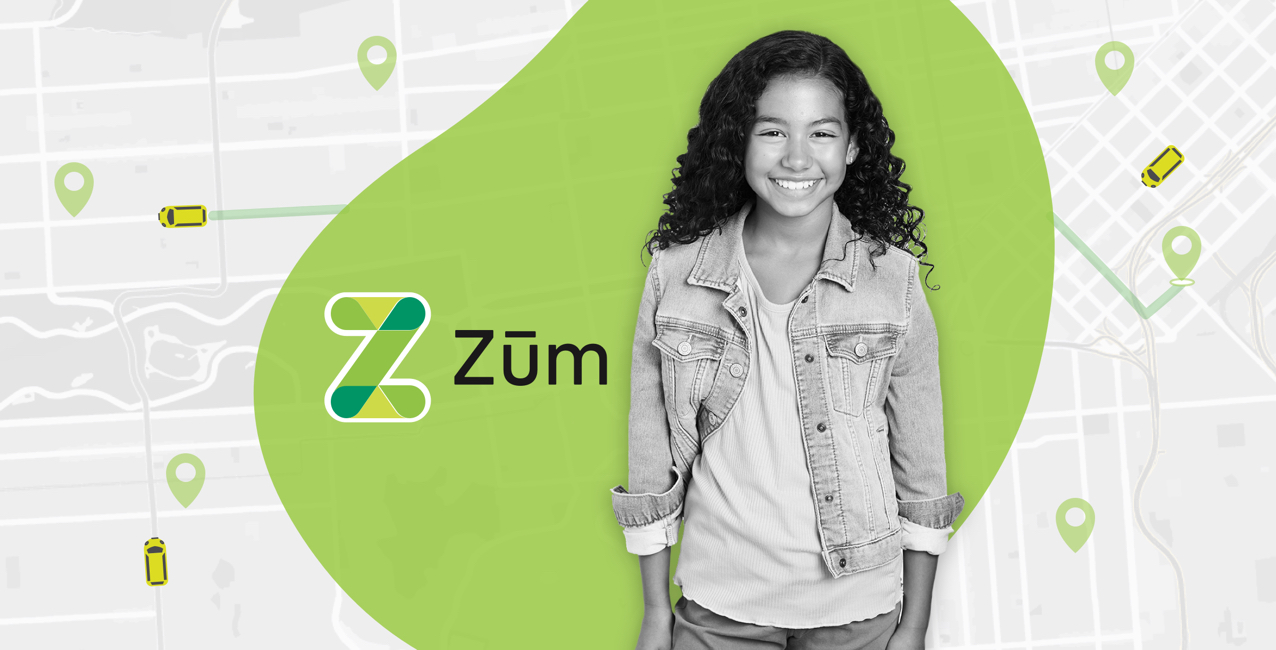 A girl smiles while standing in front of a map background with Zum branding.