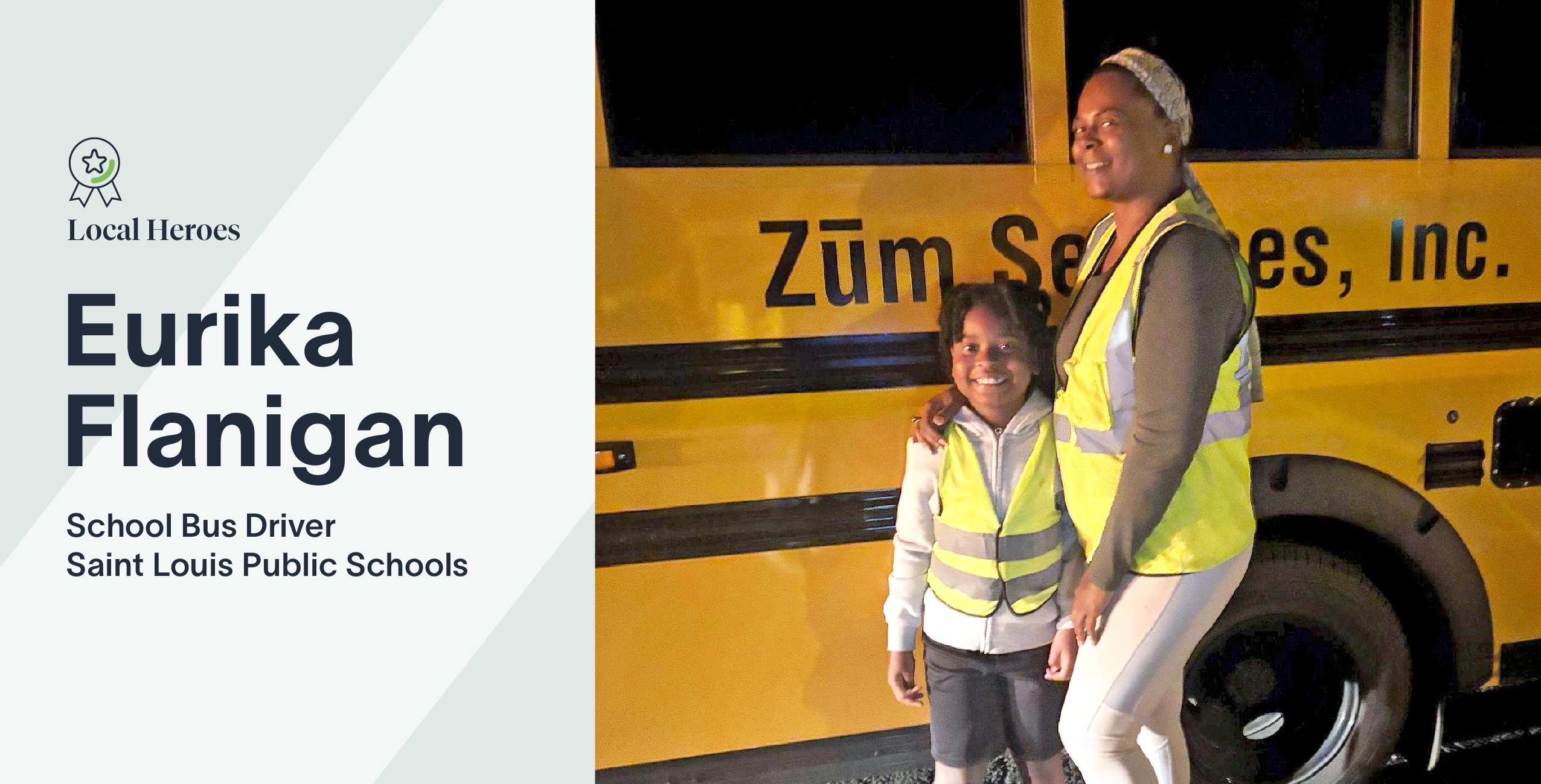 Eurika Flanigan stands with her son in front of a yellow Zum bus at night, both wearing safety