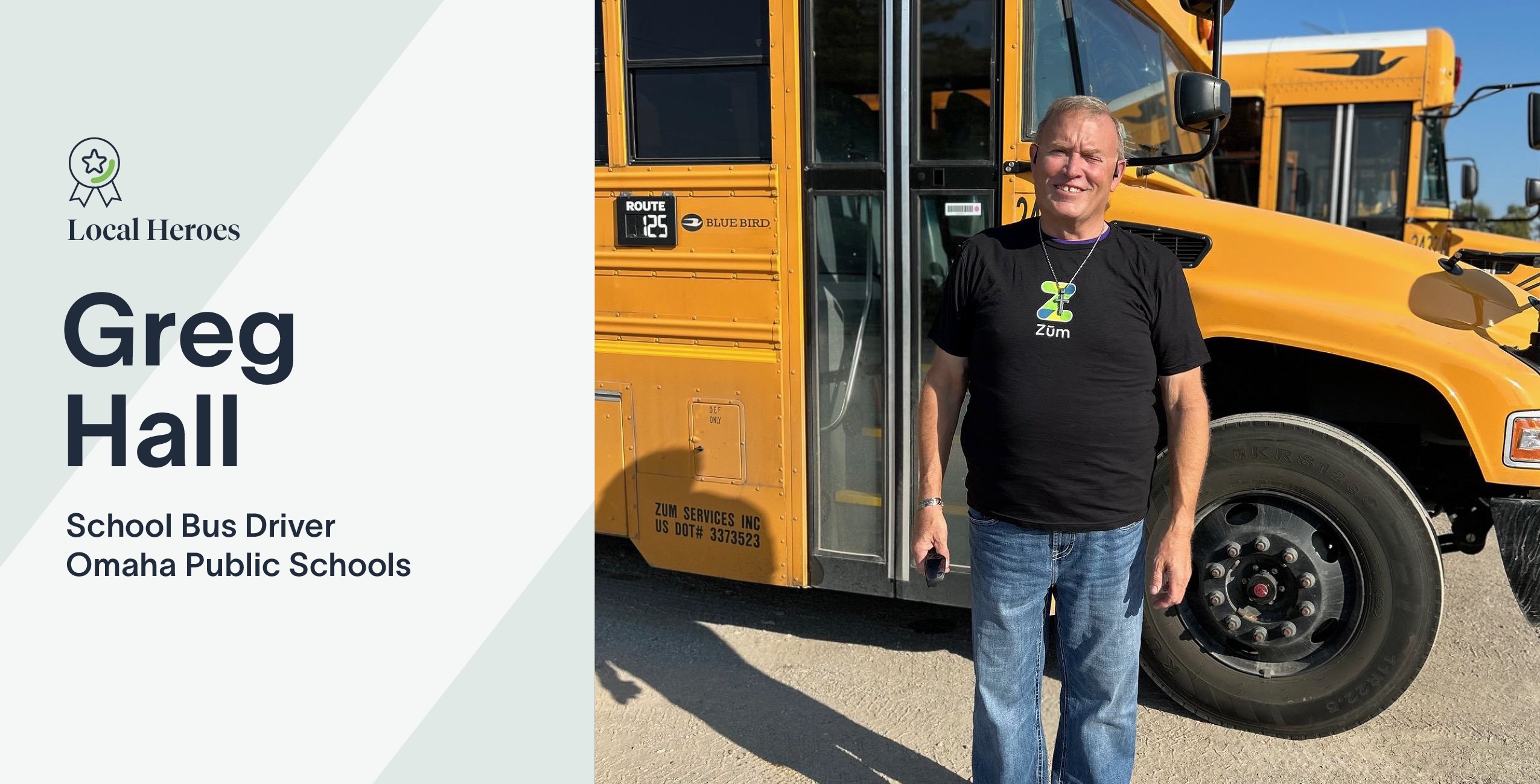 Greg Hall, a Zum school bus driver, stands next to a yellow school bus at a bus yard.