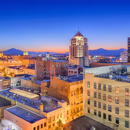 Zum service area – Roanoke, Virginia skyline at sunset with mountains