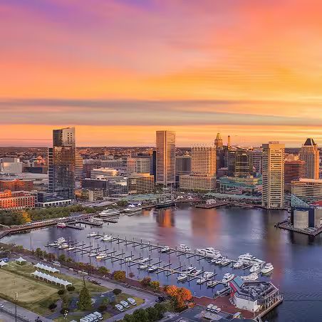 Zum service area – Baltimore, Maryland waterfront skyline at sunset