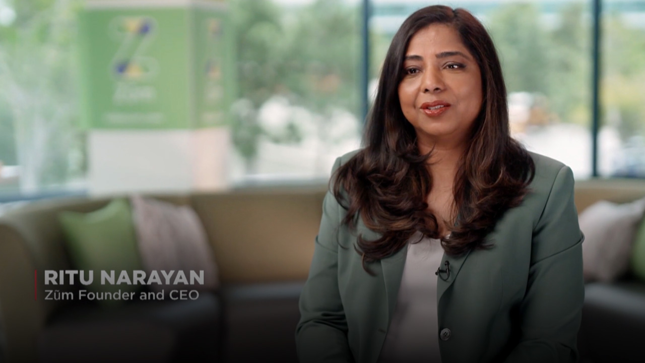 Ritu Narayan, Zum Founder and CEO, speaking in a modern office setting.