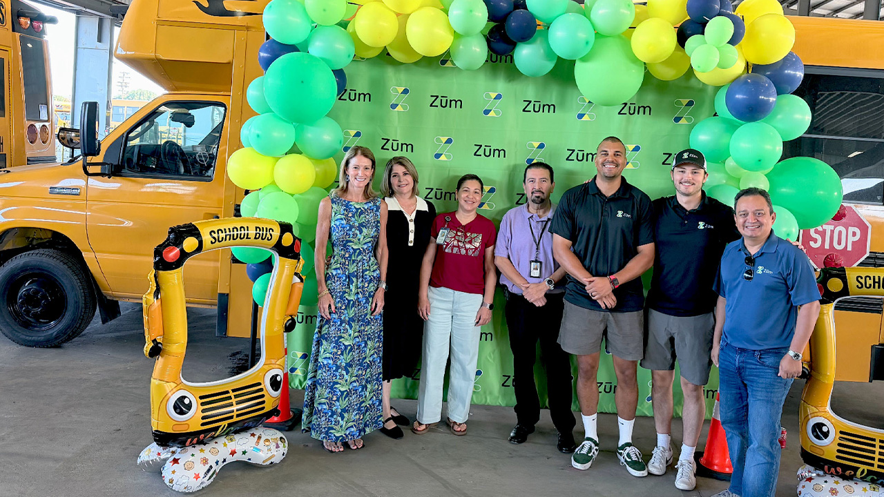 New Philadelphia operations center celebration with staff and drivers in front of a balloon