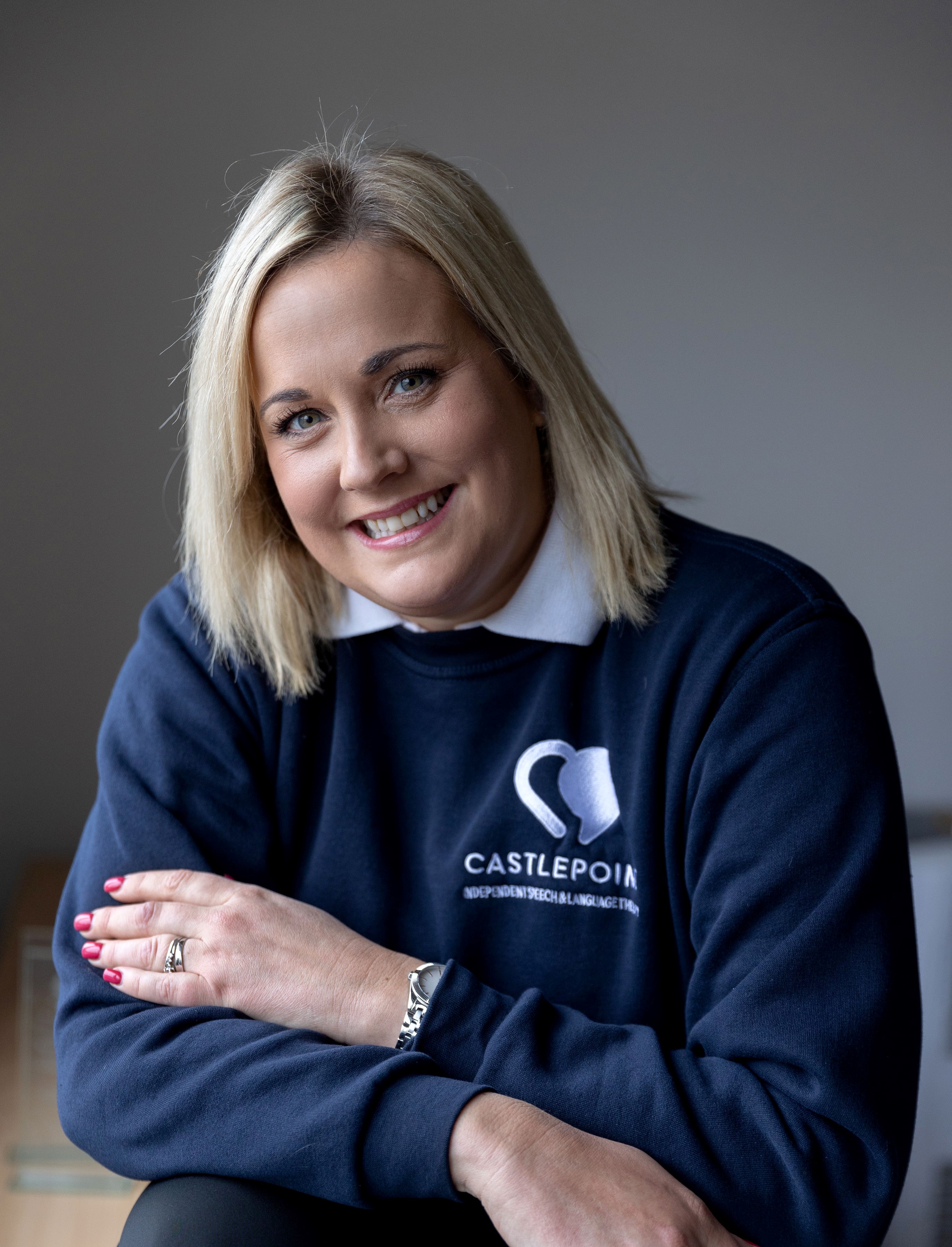 A smiling member of staff from CISLT Ltd.