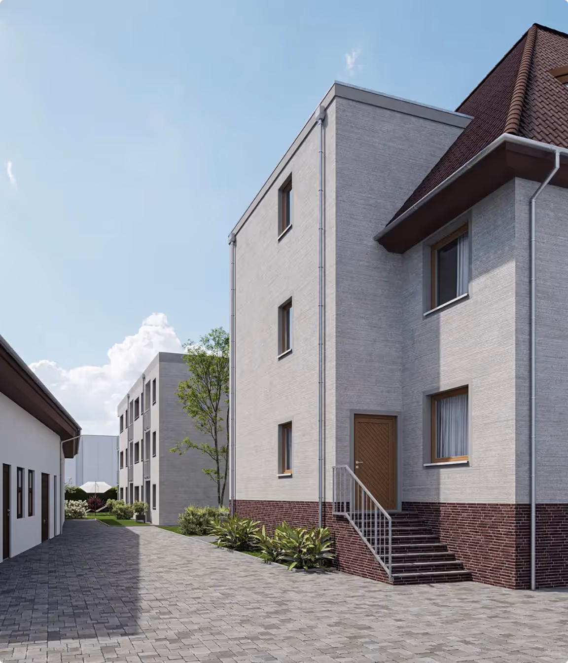 Gepflasterter Gehweg zwischen modernen mehrstöckigen Wohngebäuden mit Fensterläden und Türen.